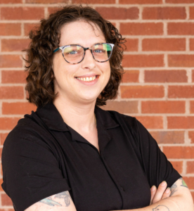 Alyssa Trifone, NorthPoint Pets team member, smiling in the store